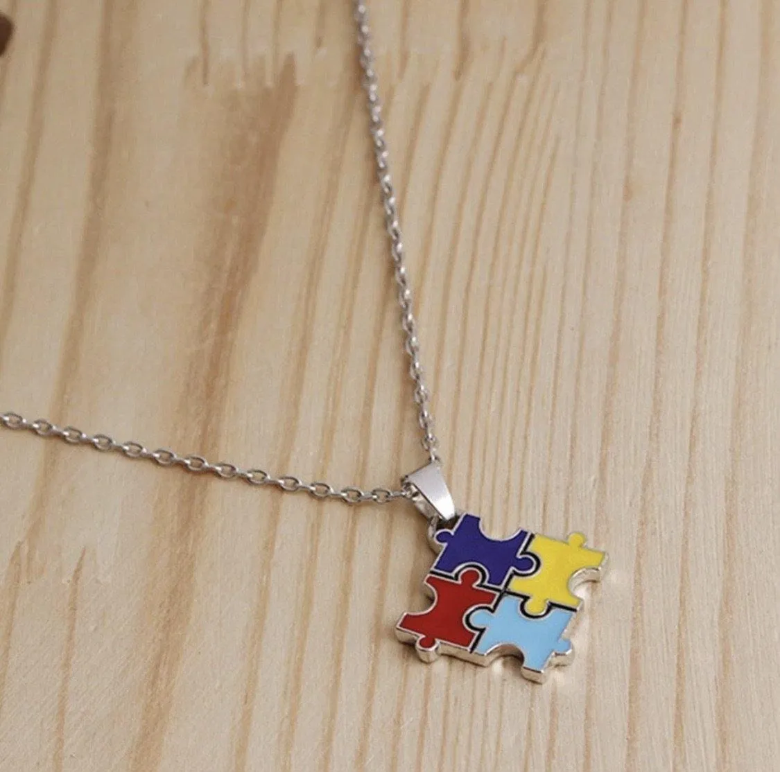 Autism Awareness bracelets and necklaces.