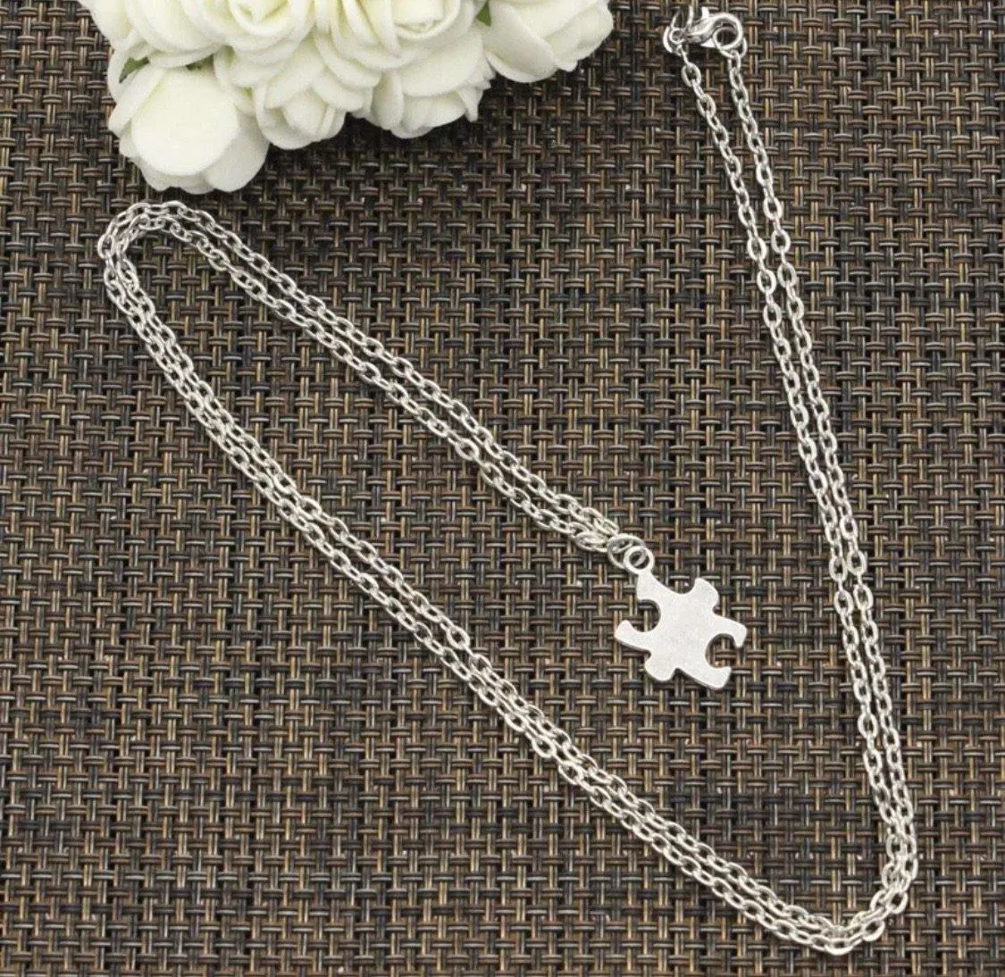 Autism Awareness bracelets and necklaces.