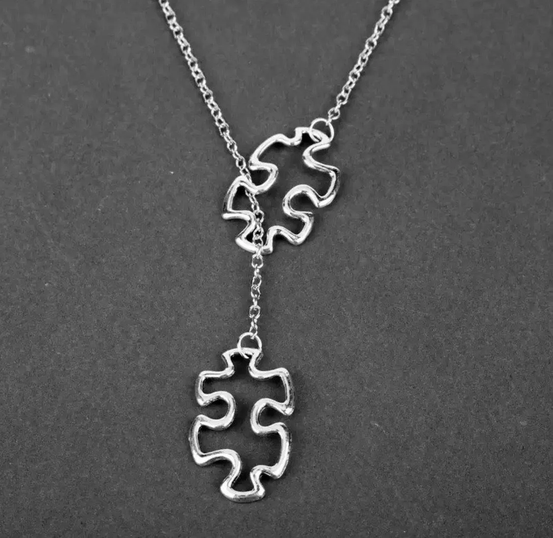 Autism Awareness bracelets and necklaces.