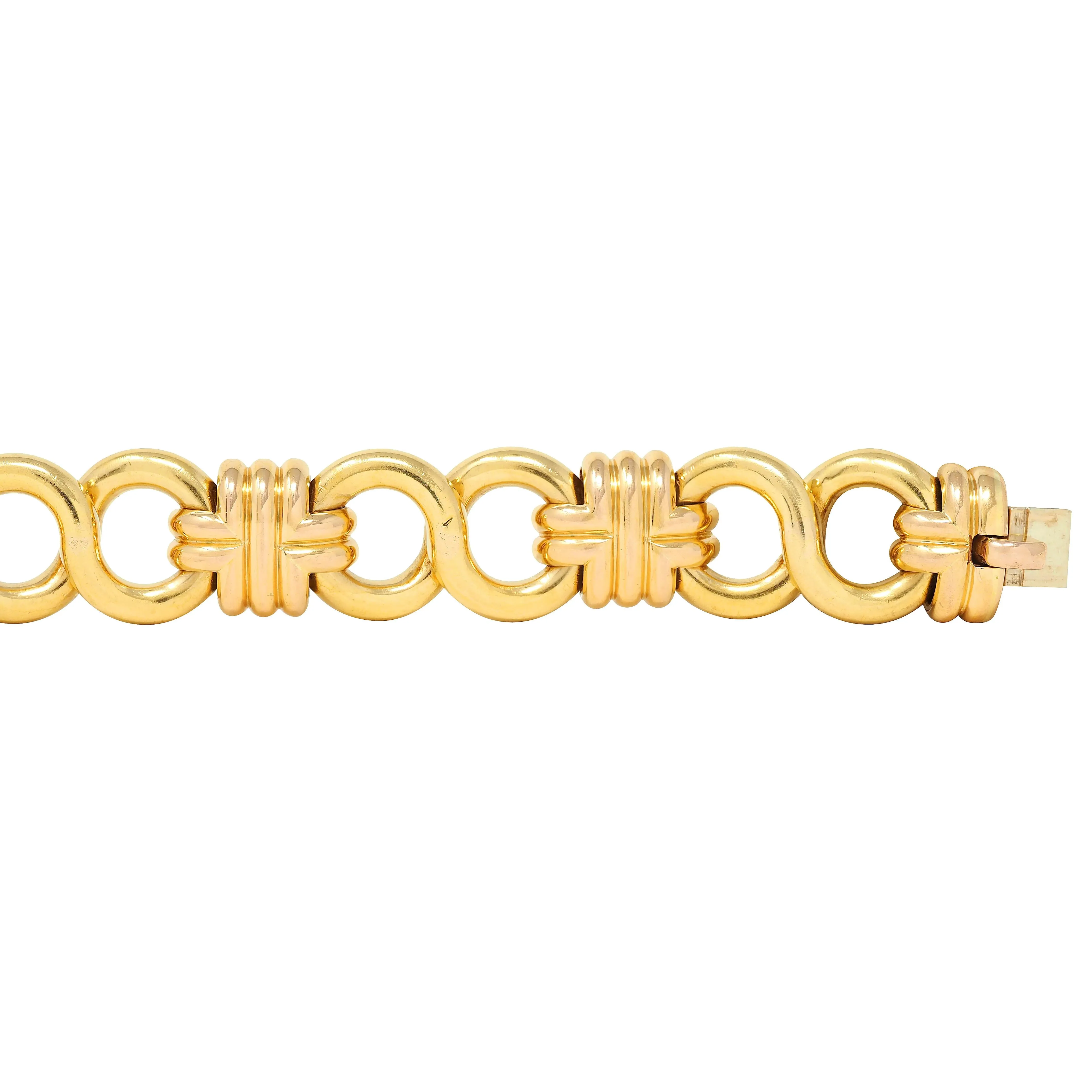 Black Starr & Frost 1980's 18 Karat Two-Tone Gold Vintage Woven Infinity Link Chain Bracelet