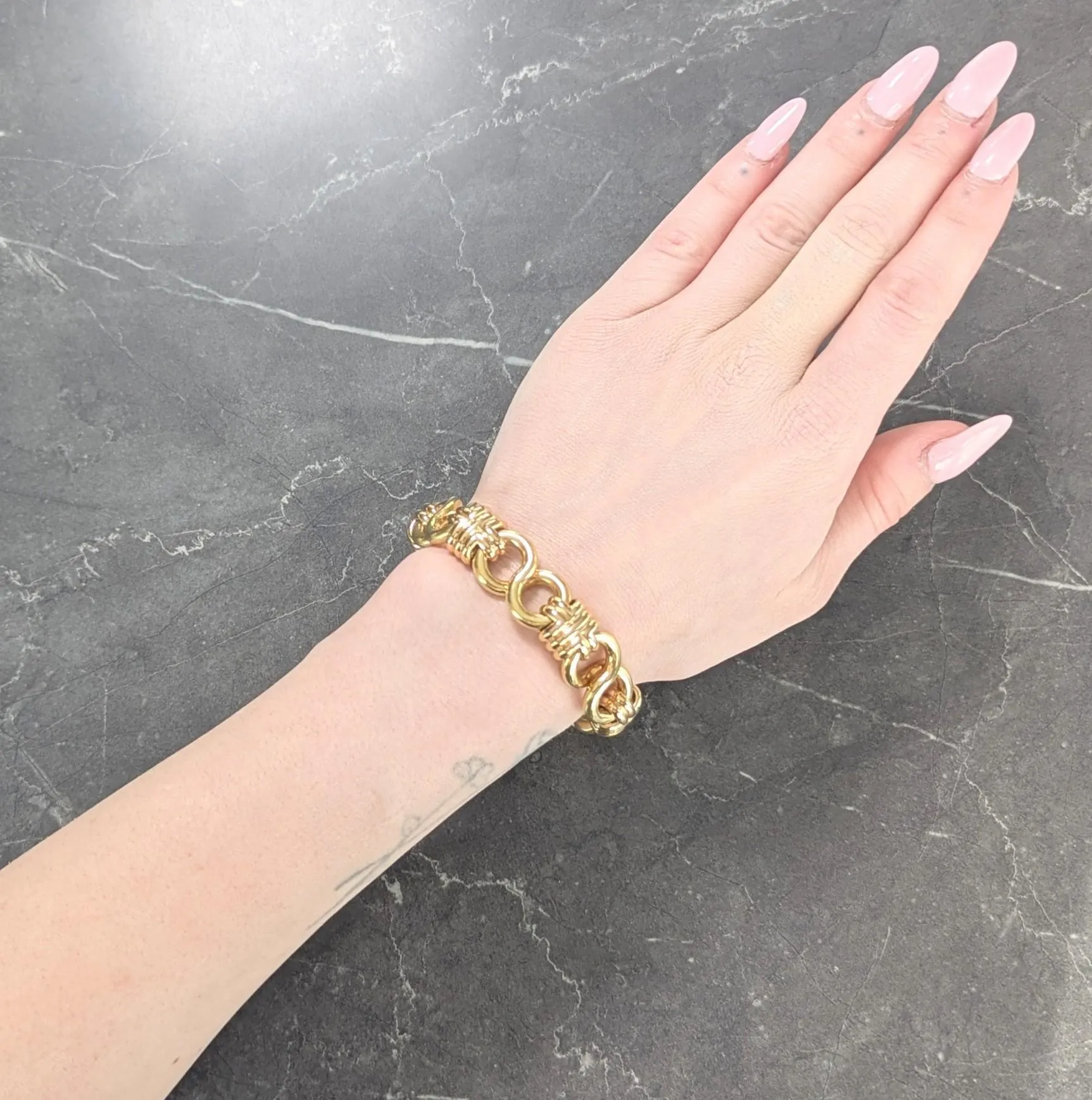 Black Starr & Frost 1980's 18 Karat Two-Tone Gold Vintage Woven Infinity Link Chain Bracelet