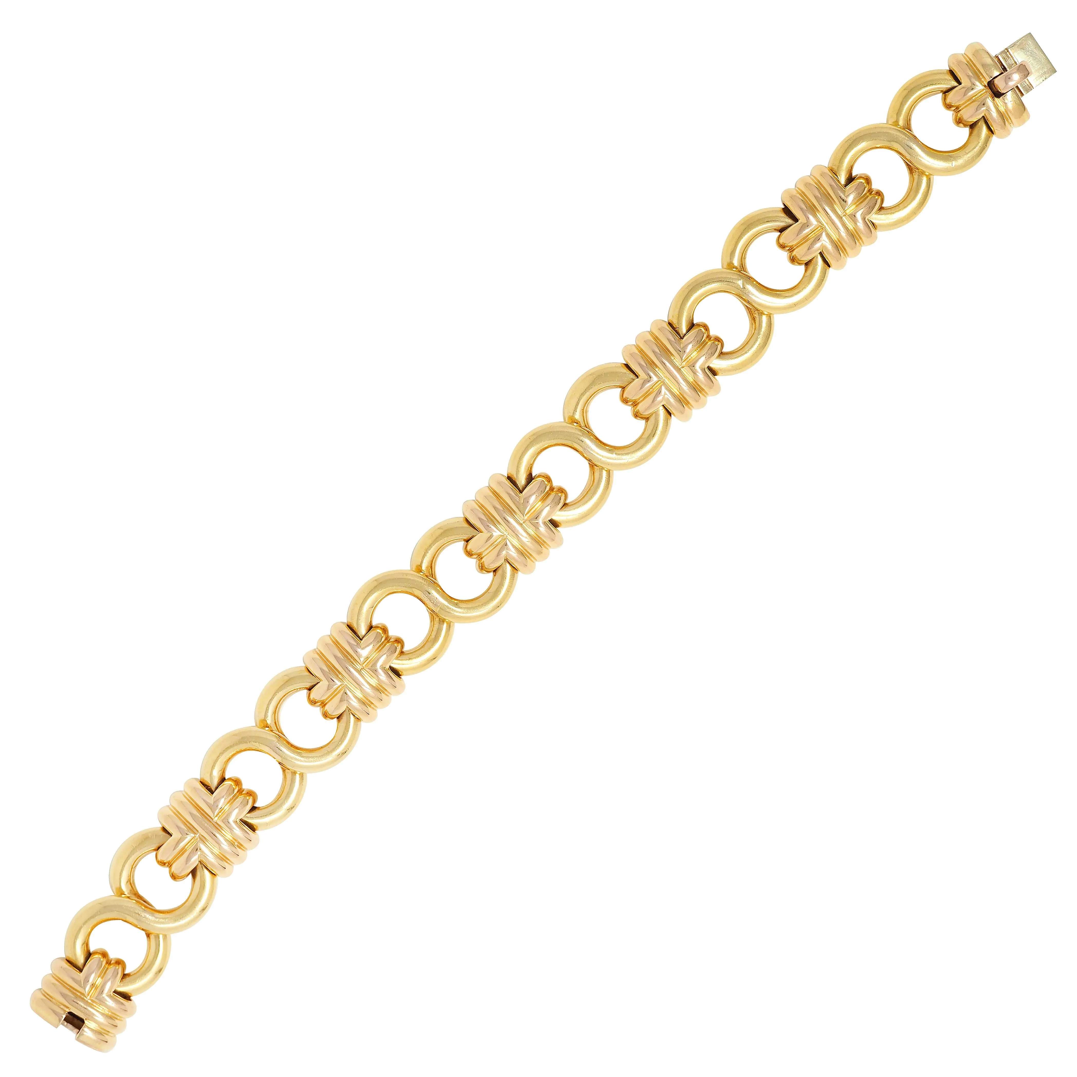 Black Starr & Frost 1980's 18 Karat Two-Tone Gold Vintage Woven Infinity Link Chain Bracelet