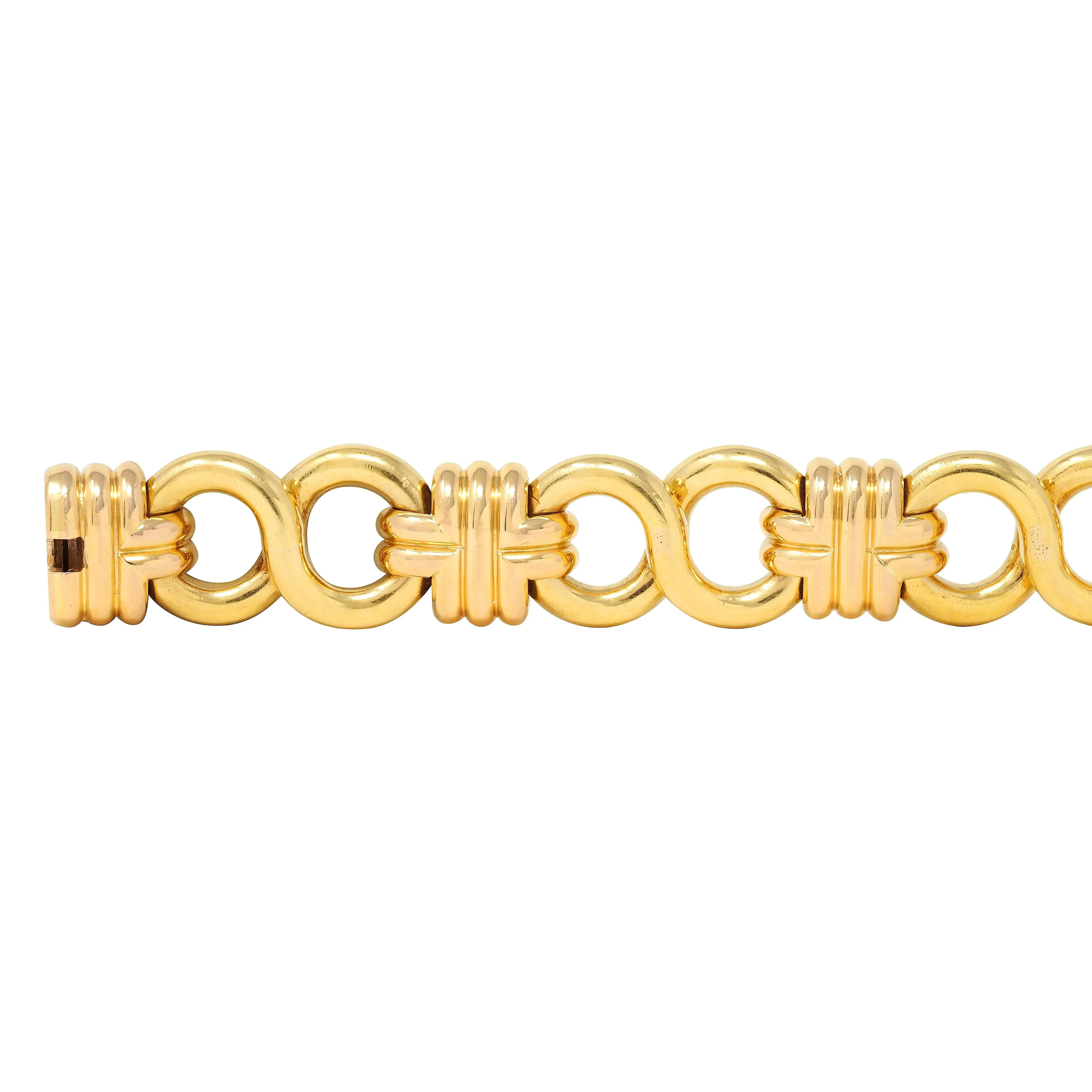Black Starr & Frost 1980's 18 Karat Two-Tone Gold Vintage Woven Infinity Link Chain Bracelet