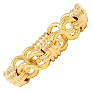 Black Starr & Frost 1980's 18 Karat Two-Tone Gold Vintage Woven Infinity Link Chain Bracelet