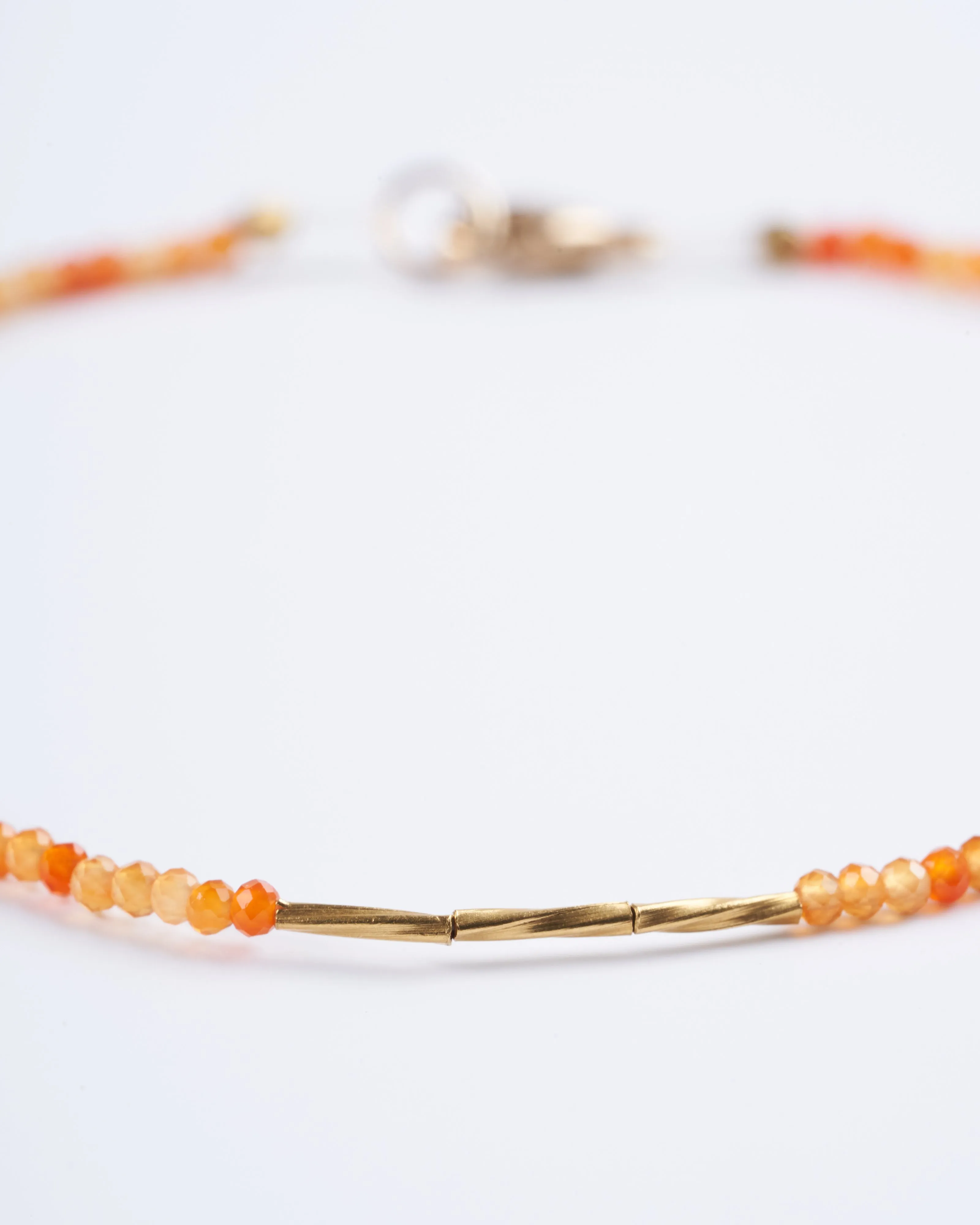 carnelian 3 twist beads gold clasp - orange