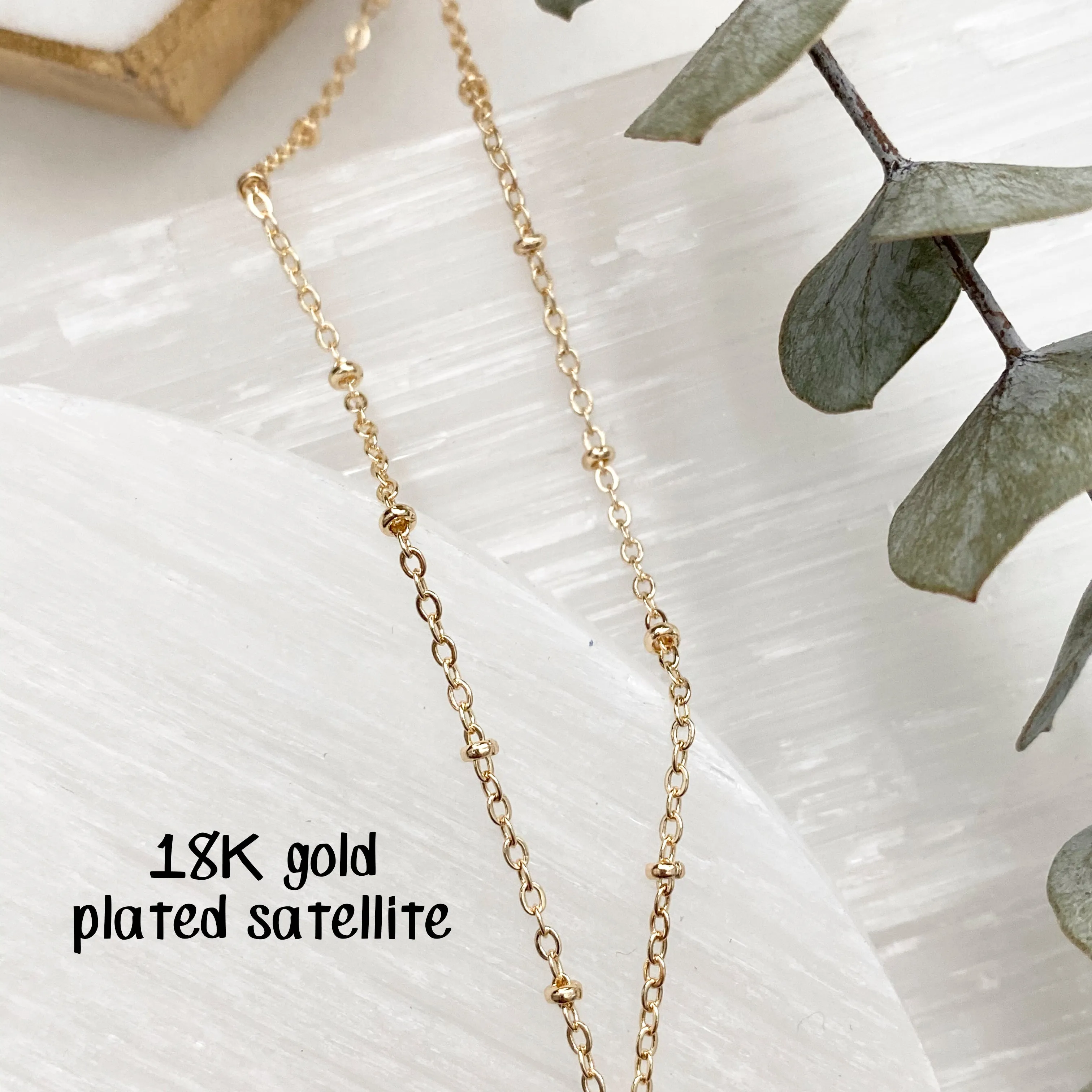 Delia Moon And Sun Face Necklace