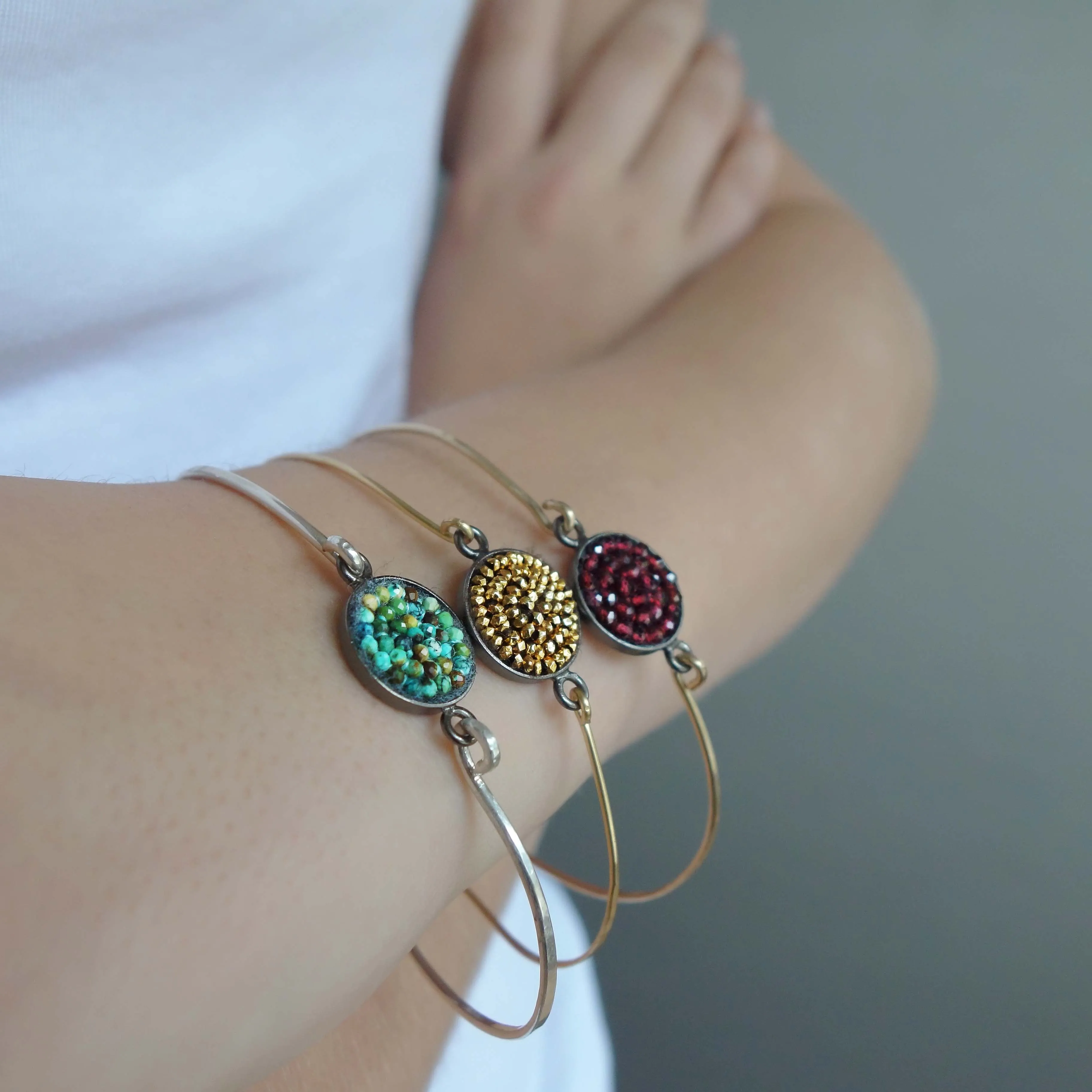Mosaic bangle: hammered gold or silver so many gems