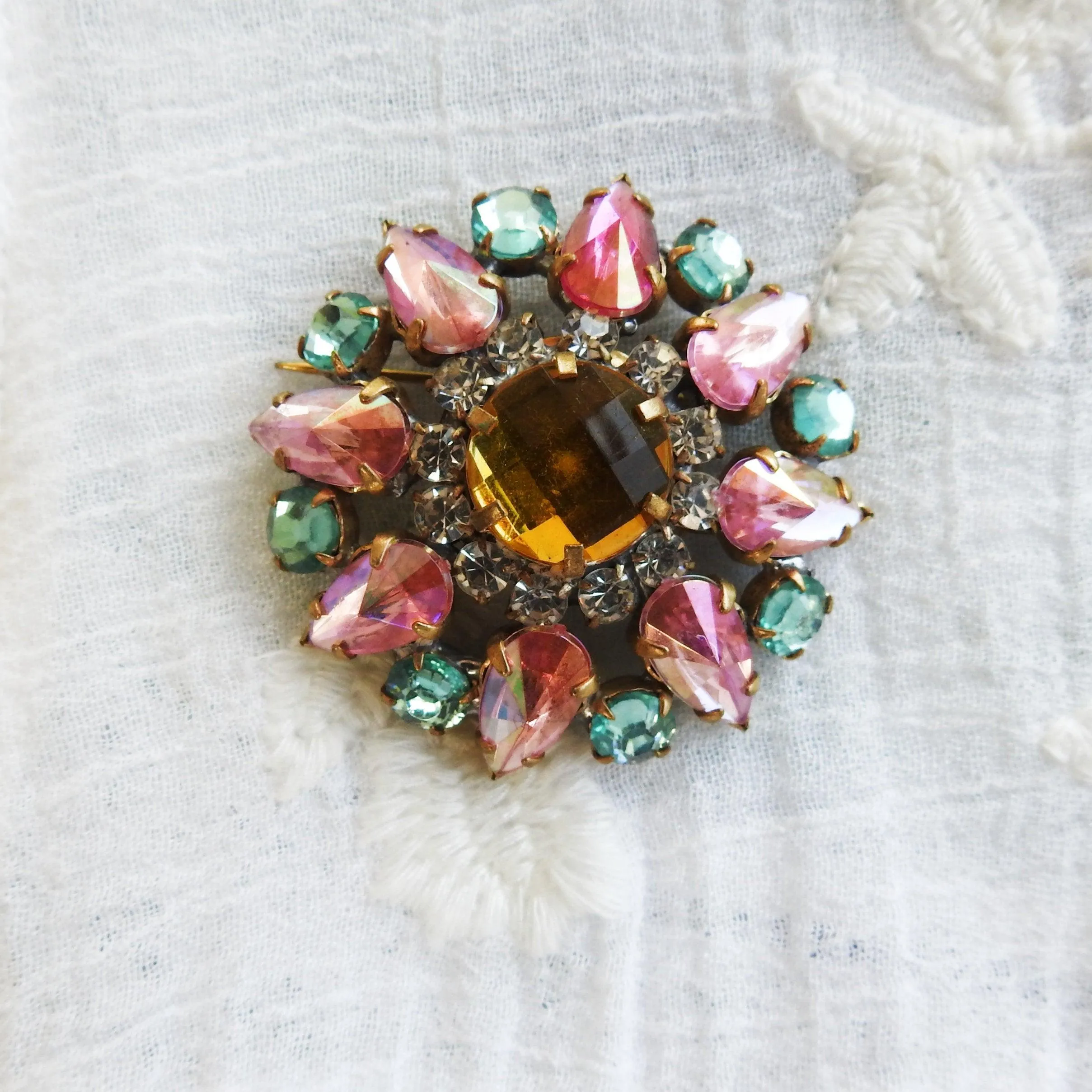 Pink and green crystal brooch