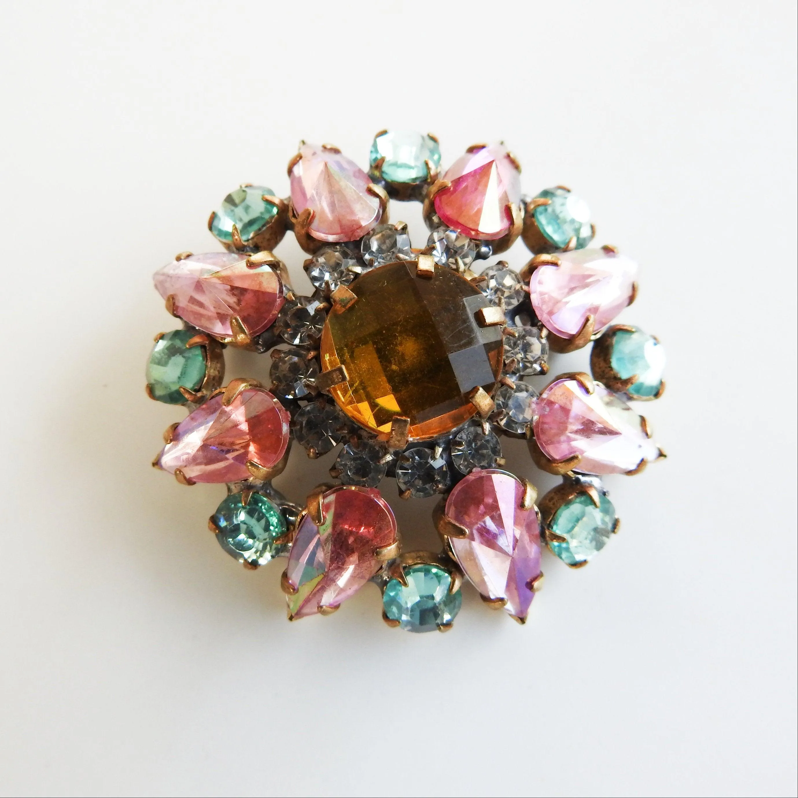 Pink and green crystal brooch