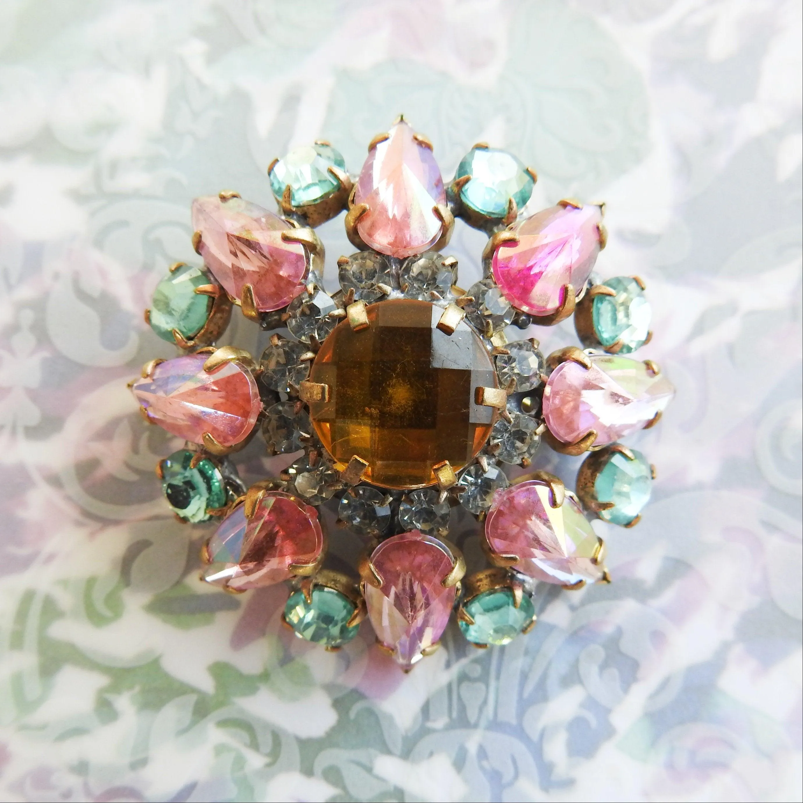 Pink and green crystal brooch