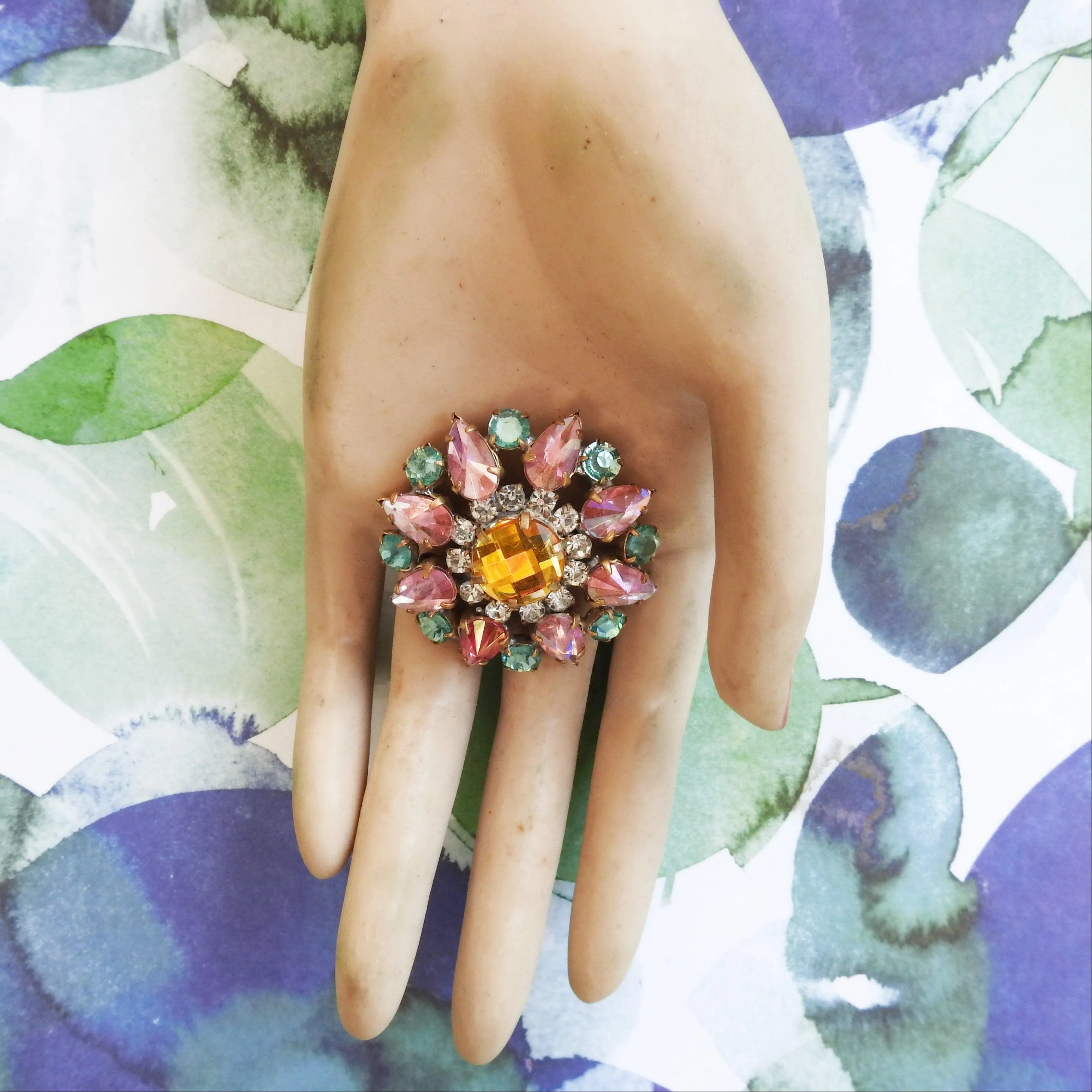 Pink and green crystal brooch