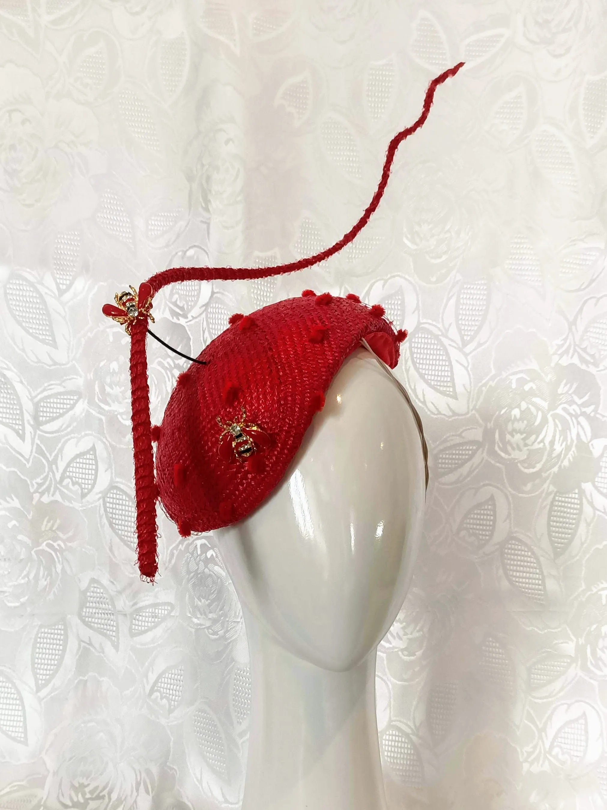 Red Straw Fascinator with Floating Quill & Ladybug Brooches