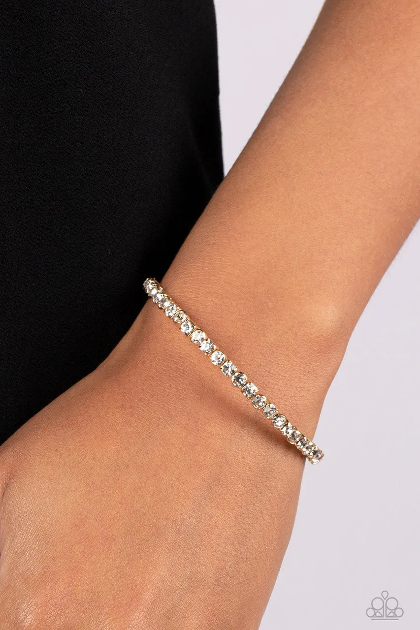 Rhinestone Spell - Gold - White Rhinestone Dainty Paparazzi Coil Bracelet