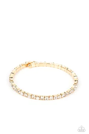 Rhinestone Spell - Gold - White Rhinestone Dainty Paparazzi Coil Bracelet