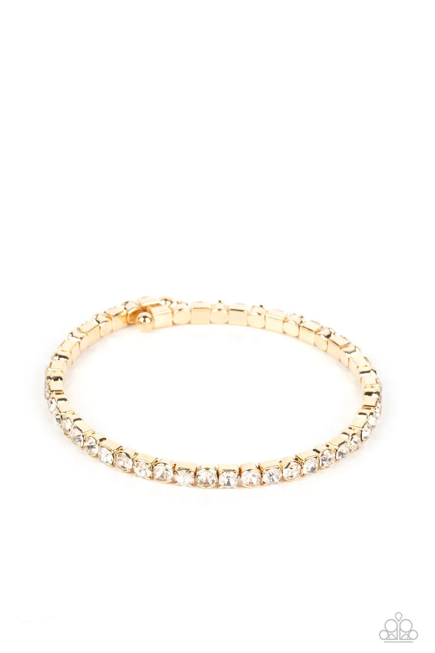 Rhinestone Spell - Gold - White Rhinestone Dainty Paparazzi Coil Bracelet