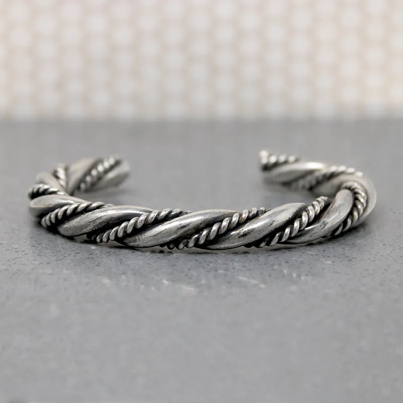 So Meta Twist within a Twist Coin Silver Cuff
