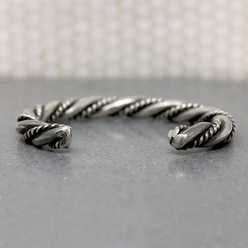 So Meta Twist within a Twist Coin Silver Cuff
