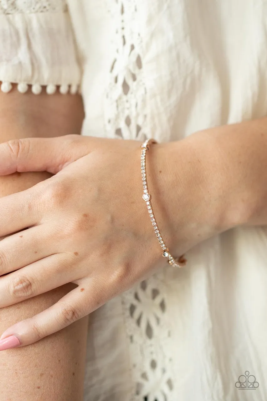 Upgraded Glamour - Gold - White Rhinestone Paparazzi Coil Bracelet